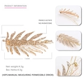 Golden acetate leaf hair clip with glitter finish, measuring 7.4cm x 3.8cm for women - Gold