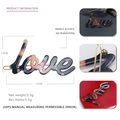 Minimalistische Haarklammer mit LOVE-Schriftzug aus Acetat mit Schildpatt-Muster - Matt Schwarz Mehrfarbig Marmor