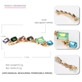Vue détaillée d'une barrette en alliage doré de 7,7 cm avec des cristaux colorés - Multicolore