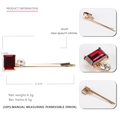 Barrette dorée en alliage ornée d'un cristal rouge rectangulaire et de strass clairs - Rouge