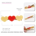 Colorful acetate heart hair clip for women featuring cream and red hearts on a gold metal base - Red and Yellow