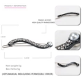 Wavy black acetate hair clip with sparkling rhinestones and a white pearl accent - S-Shaped