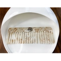 Close-up of beige marble pattern wide-tooth hair comb on a minimalist display tray - Marble Beige (2)