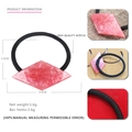 Detail view of pink geometric acetate hair tie with marble texture and dimensions - Red