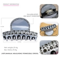 Macro view of blue acetate hair claw clip with rhinestones and golden metal spring - Gray with Gray Rhinestones