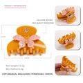 Pinza para el pelo de acetato amarillo jengibre con mariposa rosa y pedrería - Naranja Con Una Mariposa