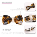 Vintage acetate bow hair clip with leopard tortoise pattern and pearl rhinestone detail - Dark Tortoiseshell