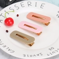 Three-piece acetate rectangular hollow hair clips in peach, pink and khaki with gold metal base - Matte Macaron Color