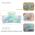 Detail of large marble acetate hair claw showing dimensions 8cm by 4cm and 22.2g weight - Magic Purple Green