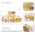 Fashionable amber tie-dye acetate claw clip with hollow design and size dimensions - Yellow