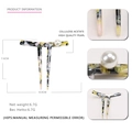Acetate hair fork with marble texture and pearl detail in elegant minimalist design - Dried Grass Green