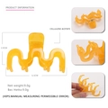 Amber translucent cellulose acetate hair claw clip with wave design, 6.5cm length - Orange