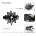 Black linen flower hair clip in acetate with hollow mesh petals and pearl center - Black