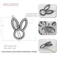 Elegant black acetate bunny ear hair clip with pearl embellishments and gold metal back - Black White Pearl