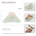 Detail view of marble acrylic claw clip showing mountain shape and gold glitter finish - Golden Mountain Small Glitter Blue Iron Base