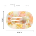 Détail de la pince à cheveux en acétate de 10,8 cm avec dimensions et motif marbré chaud - Marbre Coloré