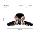 Detailansicht der 9,4 cm schwarzen Haarklammer aus Acetat mit Kristall-Schmetterling - Kristall Schmetterling Haarklammer