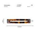 Detail showing the 6.3cm acetate rectangle hair clip with classic tortoiseshell texture - Dark Tortoiseshell