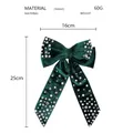 Detalle de un lazo de terciopelo verde oscuro con perlas y medidas 16cm x 25cm - Verde