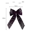 Detail view of purple velvet bow hair clip with pearls and rhinestones 16x25cm - Deep purple