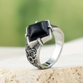 Macro shot of men's stainless steel ring with square blue goldstone in a vintage style - Silver Blue Sandstone