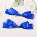 Pair of royal blue satin bow hair clips for girls with a shiny silk-like texture - Royal Blue