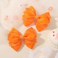 Set of two bright orange glitter bow hair clips for girls for party wear - Bright Orange