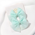 Pair of mint green tulle mesh bow hair clips for girls handmade on white card - Mint Green