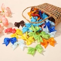 Set of mini colorful satin bow hair clips for girls in a decorative straw basket - Colorful Mixed Combo (50B)