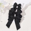 Lot de quatre barrettes à cheveux à double nœud en ruban gros-grain noir uni sur carte - Noir