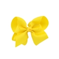 Detalle de lazo para el pelo en cinta de grosgrain amarillo con capas y nudo central - Amarillo
