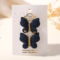 Lot de deux pinces à cheveux papillon bleu marine avec broderie en fil doré - Bleu marine