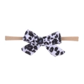Detail eines Baby Stirnbands mit weicher Leopardenmuster-Schleife und nahtlosem Band - Leopardenschleife