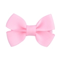 Dettaglio di un fermaglio per capelli in gros-grain rosa con texture a coste per bambine - Rosa (11)