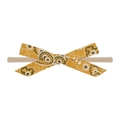 Detail of baby headband featuring ginger paisley floral bow and soft elastic nylon strap - Ginger Yellow Paisley Print Bow (7)