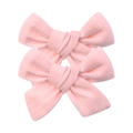Détail de nœuds en tissu rose montrant la texture naturelle du lin et le nœud fait à la main - Rose Doux (08)