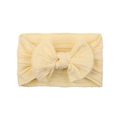 Soft pale yellow baby nylon headband featuring a large jacquard knit bow for infant girls - Light Yellow (46)