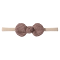 Close-up of baby waffle knit bow headband with soft texture and elastic nylon band - Dusty Pink (3)