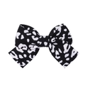 Detailed close-up showing the fabric texture of black and white milk pattern bow hair clip - Black White Spotted Style (2)