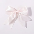 Elegant pale pink satin bow hair clip with smooth glossy silk finish for girls - Light Peach