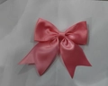 Handmade pink satin bow hair clip for girls featuring soft silk luster and a chic design - Pink