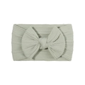 Sage green knitted nylon baby headband with large bow detail on white background - Light Green