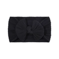 Soft nylon baby headband with large black knitted bow and vertical ribbed texture - Black