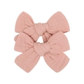 Detailed macro view of pink fabric bow hair clips for baby girls in soft linen texture - Pink Style (96)