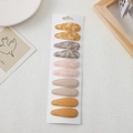 Close-up of 10 piece floral and corduroy BB hair clips set on white display card - Diverse Fabric Patchwork Style (3)