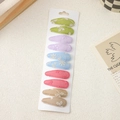 Close-up of ten embroidered floral teardrop hair clips set on a white display card - 10 Pieces Pack / Multicolor Style D