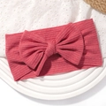 Elastic baby bow headband in deep pink ribbed cotton fabric on a white tray - Dark Pink (No. 6)
