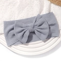 Bandeau gris côtelé pour bébé avec matière élastique douce et un grand nœud décoratif - Gris