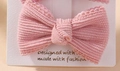 Pink corduroy bow hair clip with wavy edges for girls on a white display card - Pink Corduroy Bow Style (2)