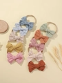 Set de 9 diademas para bebé con lazos en azul, menta y rosa con bandas de nailon elástico - Estilo de Lazo Color de Contraste